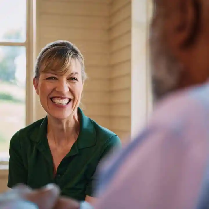 CarePro with elderly man conversation